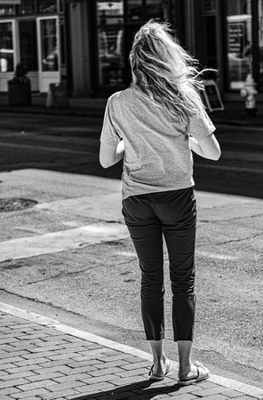 Girl with windblown hair, Vine Street