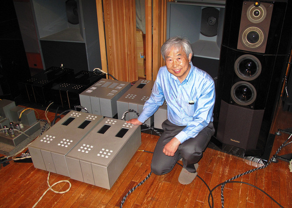 Technical Brain's Mr. Naoto Kurosawa with his TBP-Zero v2 monoblock amplifiers