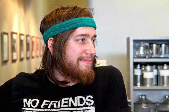 Young Man at Coffee Bar, Iris Book Cafe