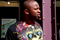 Man Outside of Rose Tattoo Parlor, Main St.