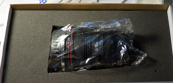 The "lens" in its wrapping and box