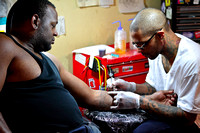 Tattoo Artist at Work, Tattoo Parlor, Main St.